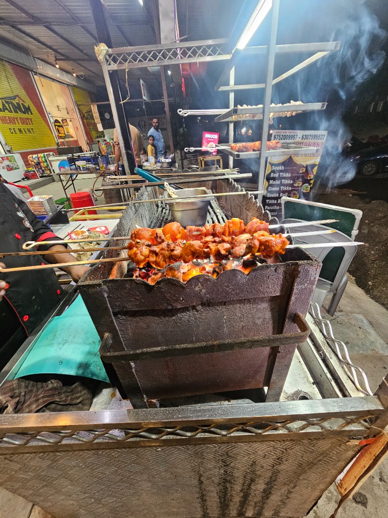 Live chicken tikka on the grill at The Street Brews
